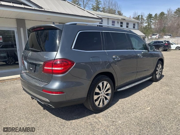 2017 Mercedes-Benz GLS with VIN 4JGDF6EE2HA841889, listed as a IAAI auction lot 42018420 with 168,629 mi miles. Bid and sale history available at carsss.com. Image 4.