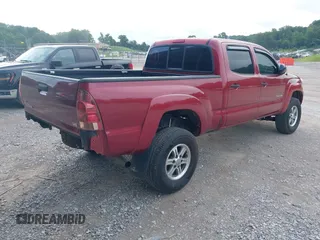 2014 Toyota Tacoma with VIN 3TMMU4FN8EM068048, listed as a IAAI auction lot 42633506 with 126,339 mi miles and . Bid and sale history available at DreamBid. Image 4.