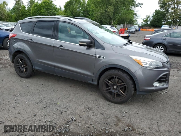 2013 Ford Escape Titanium с VIN 1FMCU9J92DUB97590, выставлен на аукционе Copart как лот 56235645 с пробегом 164 613 миль миль и Списание • Salvage title. История ставок и продаж доступна на DreamBid. Изображение 4.