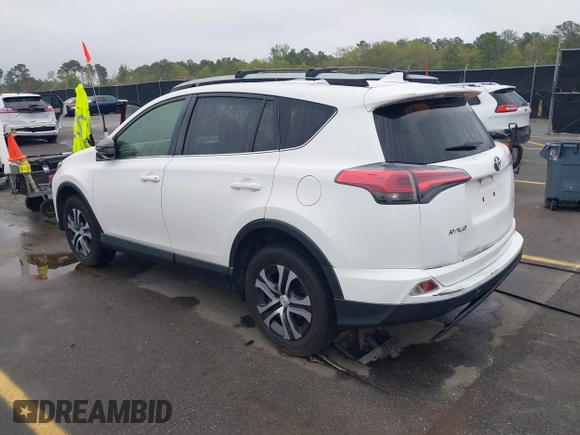 2017 Toyota RAV4 LE with VIN JTMZFREV9HJ704296, listed as a IAAI auction lot 41876996 with 85,605 mi miles and . Bid and sale history available at DreamBid. Image 3.