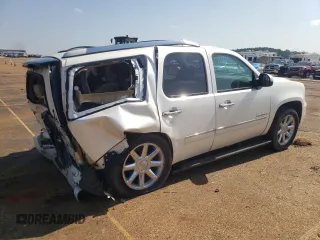 2013 GMC Yukon Denali with VIN 1GKS2EEF9DR311929, listed as a Copart auction lot 63810874 with 122,356 mi miles and Salvage Title. Bid and sale history available at carsss.com. Image 3.