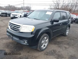 2013 Honda Pilot EX-L with VIN 5FNYF4H71DB021487, listed as a IAAI auction lot 41272308 with 188,217 mi miles and . Bid and sale history available at DreamBid. Image 2.