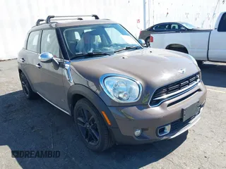 2015 MINI Countryman S z VIN WMWZC5C56FWM19704, wystawiony jako IAAI lot #42374712 z przebiegiem 77 423 mil mil oraz . Historia ofert i sprzedaży dostępna na DreamBid. Obrazek 1.