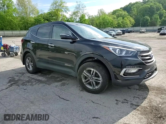 2017 Hyundai Santa Fe 2.4L z VIN 5XYZUDLB1HG412675, wystawiony jako Copart lot #57169045 z przebiegiem 38 947 mil mil oraz Szkoda całkowita • Salvage title. Historia ofert i sprzedaży dostępna na DreamBid. Obrazek 14.