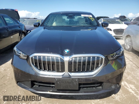 2024 BMW 5 Series 530i with VIN WBA43FJ09RCP87467, listed as a Copart auction lot 77611704 with 0 mi miles and Non Repairable. Bid and sale history available at carsss.com. Image 5.