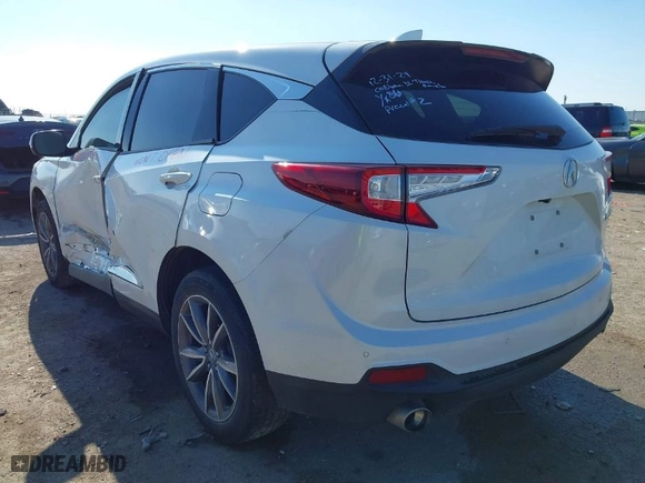2020 Acura RDX w/Technology Pkg with VIN 5J8TC1H59LL011089, listed as a IAAI auction lot 41246036 with 66,261 mi miles. Bid and sale history available at carsss.com. Image 3.