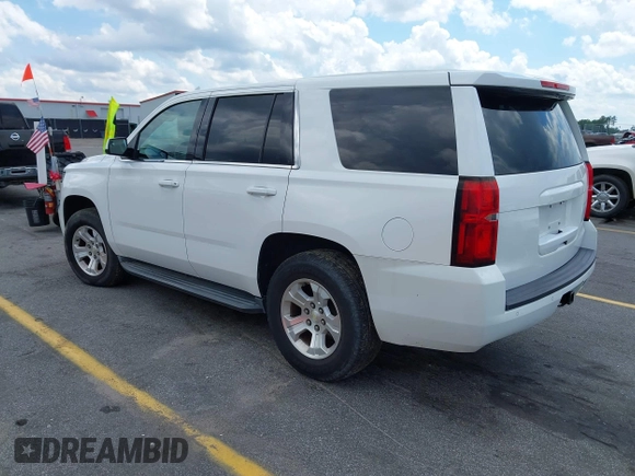 2015 Chevrolet Tahoe Commercial z VIN 1GNLC2EC1FR721538, wystawiony jako IAAI lot #42274601 z przebiegiem 138 991 mil mil oraz . Historia ofert i sprzedaży dostępna na DreamBid. Obrazek 3.