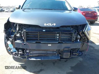 2023 Kia Sportage EX with VIN KNDPVCAG8P7019572, listed as a IAAI auction lot 42226335 with 68,583 mi miles and . Bid and sale history available at DreamBid. Image 6.