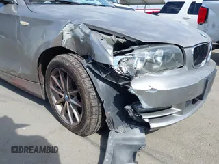 2011 BMW 1 Series 128i с VIN WBAUN1C56BVH82939, выставлен на аукционе IAAI как лот 41700305 с пробегом 91 792 миль миль и . История ставок и продаж доступна на DreamBid. Изображение 6.