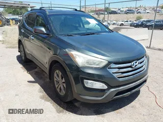 2014 Hyundai Santa Fe z VIN 5XYZUDLB9EG169614, wystawiony jako IAAI lot #42208166 z przebiegiem 139 103 mil mil oraz . Historia ofert i sprzedaży dostępna na DreamBid. Obrazek 1.