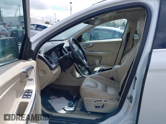 2014 Volvo XC60 R-Design Premier Plus z VIN YV4902DZ5E2554526, wystawiony jako IAAI lot #41764512 z przebiegiem 129 230 mil mil oraz . Historia ofert i sprzedaży dostępna na DreamBid. Obrazek 5.