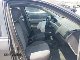2007 Ford Focus S z VIN 1FAFP34N17W123378, wystawiony jako IAAI lot #42208033 z przebiegiem 183 803 mil mil oraz . Historia ofert i sprzedaży dostępna na DreamBid. Obrazek 5.