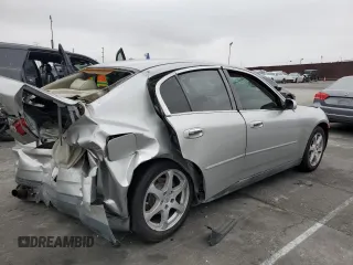 2003 Infiniti G35 w/Leather with VIN JNKCV51E73M016617, listed as a Copart auction lot 60571025 with 244,954 mi miles and Salvage title. Bid and sale history available at DreamBid. Image 3.
