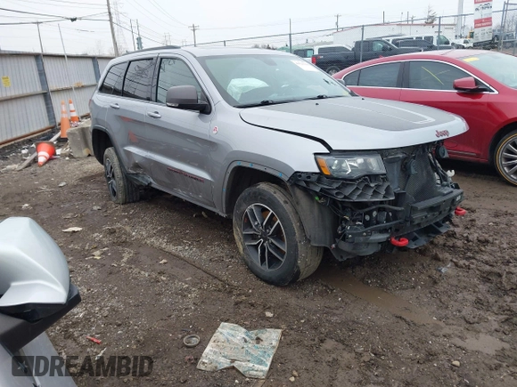 2021 Jeep Grand Cherokee Trailhawk with VIN 1C4RJFLG2MC579884, listed as a IAAI auction lot 41526769 with 115,461 mi miles. Bid and sale history available at carsss.com. Image 1.