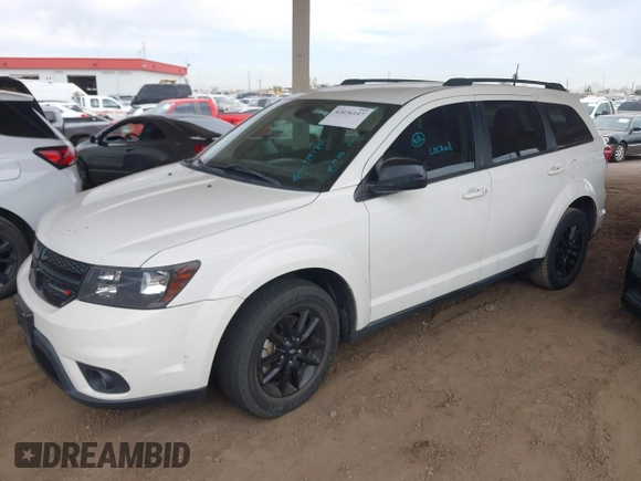 2019 Dodge Journey SE with VIN 3C4PDCBB7KT797842, listed as a IAAI auction lot 42036147 with 163,919 mi miles and . Bid and sale history available at DreamBid. Image 17.