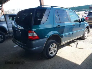 1998 Mercedes-Benz M-Class with VIN 4JGAB54E0WA024864, listed as a IAAI auction lot 39138301 with 200,546 mi miles. Bid and sale history available at carsss.com. Image 4.