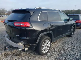 2014 Jeep Cherokee Latitude with VIN 1C4PJMCS7EW180565, listed as a IAAI auction lot 41770555 with 175,629 mi miles and . Bid and sale history available at DreamBid. Image 4.
