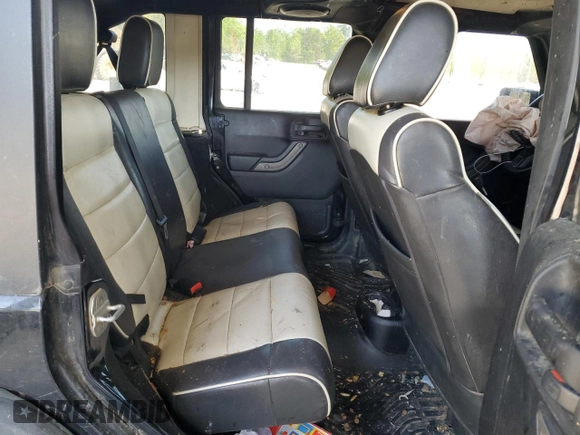 2011 Jeep Wrangler Unlimited Sport with VIN 1J4HA3H19BL574932, listed as a Copart auction lot 53250465 with 113,344 mi miles and Salvage Title. Bid and sale history available at carsss.com. Image 10.
