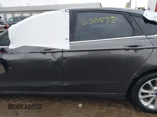 2020 Ford Fusion SE z VIN 3FA6P0LU6LR185721, wystawiony jako IAAI lot #41639827 z przebiegiem 63 857 mil mil oraz . Historia ofert i sprzedaży dostępna na DreamBid. Obrazek 14.