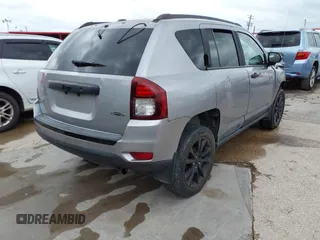 2014 Jeep Compass Sport with VIN 1C4NJCBA3ED769764, listed as a IAAI auction lot 42147739 with 141,979 mi miles. Bid and sale history available at carsss.com. Image 4.