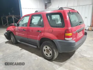 2001 Ford Escape XLS with VIN 1FMYU01181KD99269, listed as a Copart auction lot 88463335 with 217,537 mi miles and Salvage title. Bid and sale history available at DreamBid. Image 2.