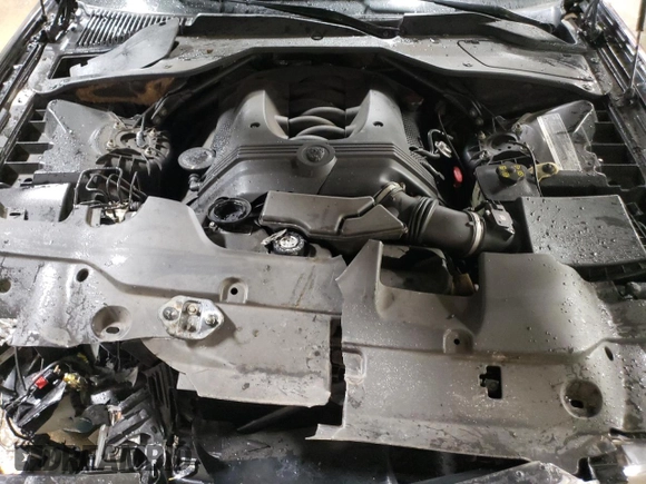 2005 Jaguar XJ Vanden Plas z VIN SAJWA82C65SG44373, wystawiony jako Copart lot #84091444 z przebiegiem 141 993 mil mil oraz Szkoda całkowita • Salvage title. Historia ofert i sprzedaży dostępna na DreamBid. Obrazek 11.