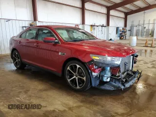 2015 Ford Taurus SEL with VIN 1FAHP2E83FG143653, listed as a Copart auction lot 59280645 with 77,048 mi miles and Salvage title. Bid and sale history available at DreamBid. Image 4.
