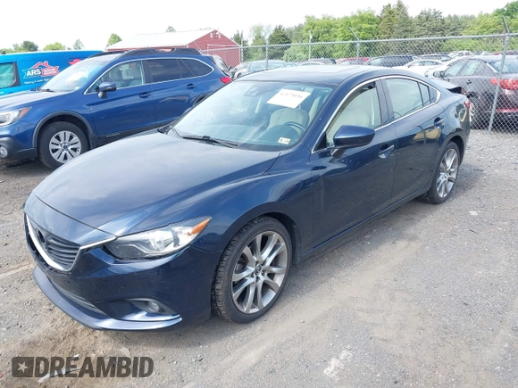 2015 Mazda 6 i Grand Touring with VIN JM1GJ1W53F1200121, listed as a IAAI auction lot 42173036 with 76,184 mi miles and . Bid and sale history available at DreamBid. Image 18.