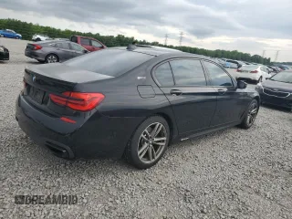 2018 BMW 7 Series 740e xDrive with VIN WBA7J2C59JB246238, listed as a Copart auction lot 53777335 with 76,642 mi miles and Salvage Title. Bid and sale history available at carsss.com. Image 3.