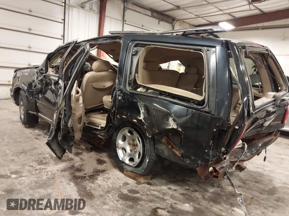 2001 Lincoln Navigator with VIN 5LMFU28A11LJ03590, listed as a IAAI auction lot 42442449 with Not provided miles and . Bid and sale history available at DreamBid. Image 3.