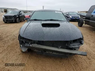 2002 Ford Mustang GT Deluxe with VIN 1FAFP42X42F214888, listed as a Copart auction lot 44379755 with 77,207 mi miles and Salvage Title. Bid and sale history available at carsss.com. Image 5.