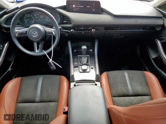 2024 Mazda 3 Carbon Edition with VIN 3MZBPBXYXRM409075, listed as a Copart auction lot 59189265 with 23,114 mi miles and Salvage title. Bid and sale history available at DreamBid. Image 8.
