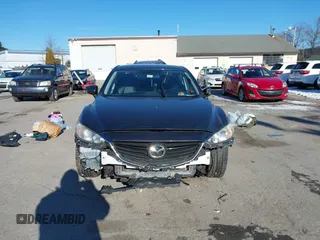 2015 Mazda 6 i Touring with VIN JM1GJ1V60F1170067, listed as a IAAI auction lot 41259559 with 131,055 mi miles and . Bid and sale history available at DreamBid. Image 11.