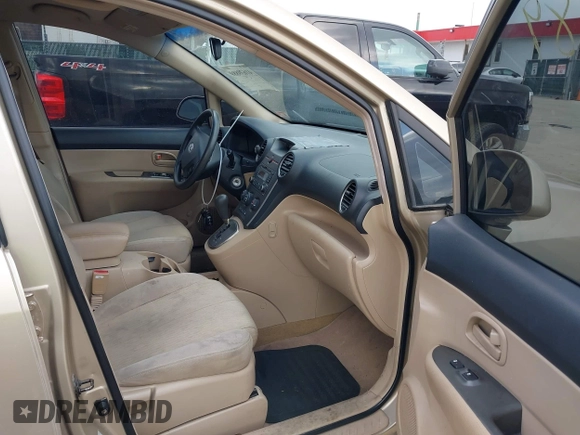 2007 Kia Rondo LX Base with VIN KNAFG525X77050706, listed as a IAAI auction lot 41639889 with 139,095 mi miles. Bid and sale history available at carsss.com. Image 5.