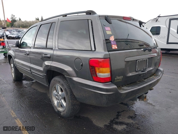 2004 Jeep Grand Cherokee Limited with VIN 1J4GW58N34C399673, listed as a IAAI auction lot 41976505 with 194,005 mi miles. Bid and sale history available at carsss.com. Image 3.