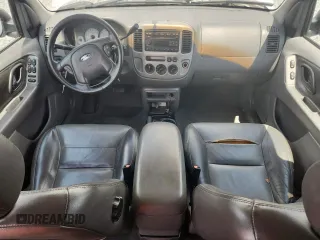 2003 Ford Escape XLT Popular with VIN 1FMYU03103KA06199, listed as a Copart auction lot 58731515 with 181,429 mi miles and Salvage title. Bid and sale history available at DreamBid. Image 8.