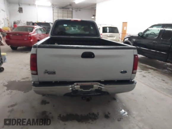 2002 Ford F-150 XL with VIN 1FTRX17W52NB23883, listed as a IAAI auction lot 41721680 with 144,115 mi miles. Bid and sale history available at carsss.com. Image 16.