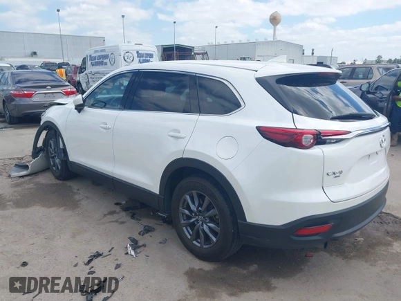 2022 Mazda CX-9 Touring with VIN JM3TCBCY0N0608052, listed as a IAAI auction lot 42027465 with 65,313 mi miles and . Bid and sale history available at DreamBid. Image 3.