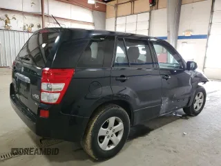 2012 Suzuki Grand Vitara Premium z VIN JS3TD0D66C4100814, wystawiony jako Copart lot #89250025 z przebiegiem 102 381 mil mil oraz Szkody całkowita. Historia ofert i sprzedaży dostępna na DreamBid. Obrazek 3.