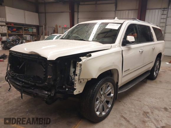 2015 GMC Yukon XL Denali with VIN 1GKS2JKJ1FR635901, listed as a IAAI auction lot 41805739 with 120,998 mi miles and . Bid and sale history available at carsss.com. Image 2.
