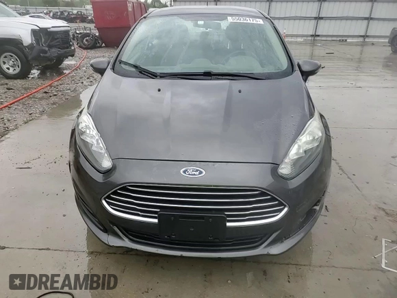 2016 Ford Fiesta SE z VIN 3FADP4BJ8GM143270, wystawiony jako Copart lot #55036175 z przebiegiem 205 303 mil mil oraz Szkoda całkowita • Salvage title. Historia ofert i sprzedaży dostępna na DreamBid. Obrazek 14.