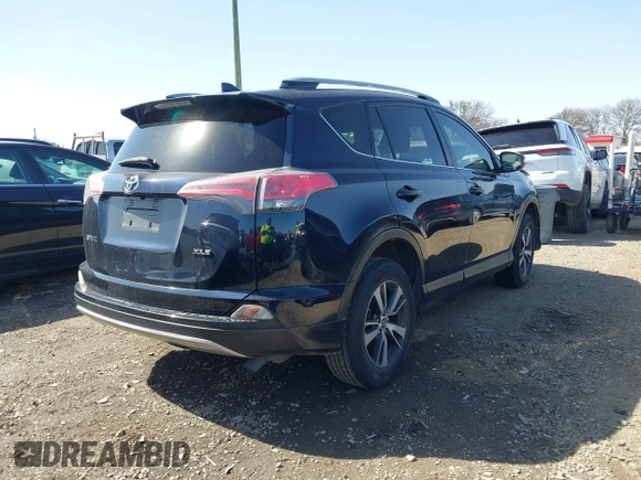 2018 Toyota RAV4 XLE with VIN JTMWFREV7JJ186925, listed as a IAAI auction lot 41717611 with 79,580 mi miles. Bid and sale history available at carsss.com. Image 4.