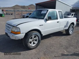 1999 Ford Ranger XL with VIN 1FTZR15V9XPA97496, listed as a IAAI auction lot 41885037 with 205,661 mi miles. Bid and sale history available at carsss.com. Image 2.