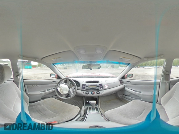 2004 Toyota Camry LE z VIN JTDBE32KX40273821, wystawiony jako Copart lot #58938275 z przebiegiem 153 096 mil mil oraz Szkoda całkowita • Salvage title. Historia ofert i sprzedaży dostępna na DreamBid. Obrazek 14.