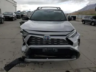 2021 Toyota RAV4 Hybrid XSE with VIN 4T3E6RFV2MU016441, listed as a Copart auction lot 57090975 with 69,304 mi miles and Salvage title. Bid and sale history available at DreamBid. Image 5.