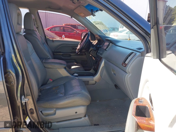 2004 Honda Pilot EX with VIN 5FNYF185X4B009044, listed as a IAAI auction lot 42175686 with 227,861 mi miles and . Bid and sale history available at DreamBid. Image 5.