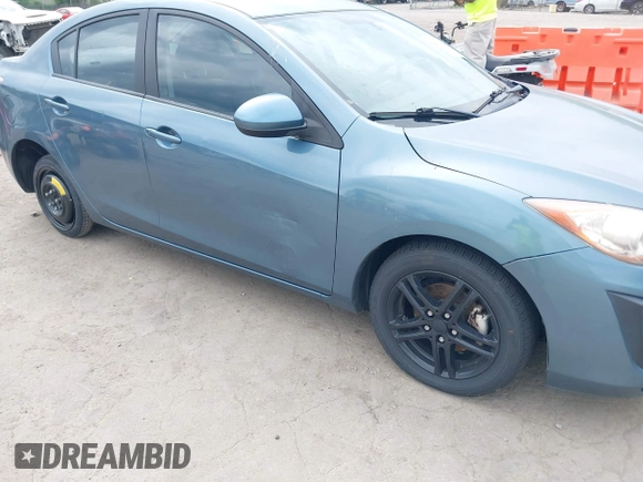 2011 Mazda Mazda3 i Sport with VIN JM1BL1UF9B1465202, listed as a IAAI auction lot 42119001 with 122,198 mi miles. Bid and sale history available at carsss.com. Image 6.