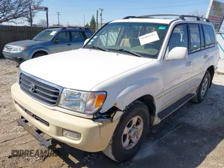 2000 Toyota Land Cruiser z VIN JT3HT05J5Y0126396, wystawiony jako IAAI lot #41986185 z przebiegiem 201 156 mil mil oraz . Historia ofert i sprzedaży dostępna na DreamBid. Obrazek 2.