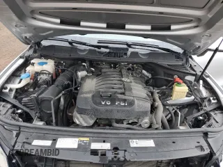 2014 Volkswagen Touareg Sport с VIN WVGEF9BP0ED014429, выставлен на аукционе Copart как лот 58692875 с пробегом 157 417 миль миль и Списание • Salvage title. История ставок и продаж доступна на DreamBid. Изображение 12.