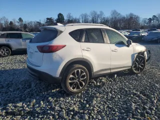 2016 Mazda CX-5 Grand Touring with VIN JM3KE2DY8G0734716, listed as a Copart auction lot 85675354 with 130,802 mi miles and Salvage Title. Bid and sale history available at carsss.com. Image 3.